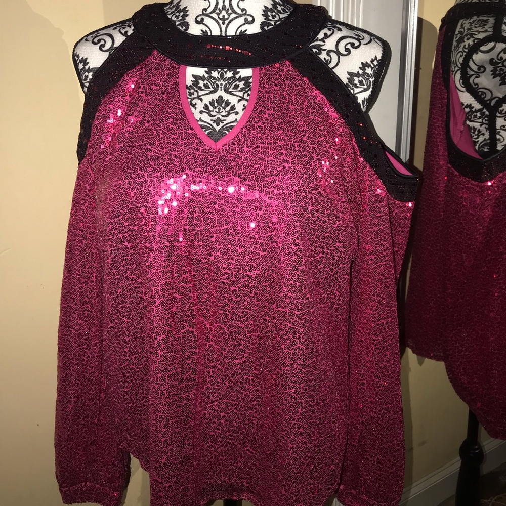 Open shoulder, sequin top.